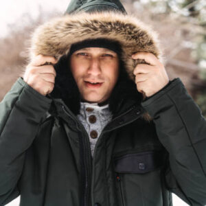 Stylish young man wearing a winter jacket